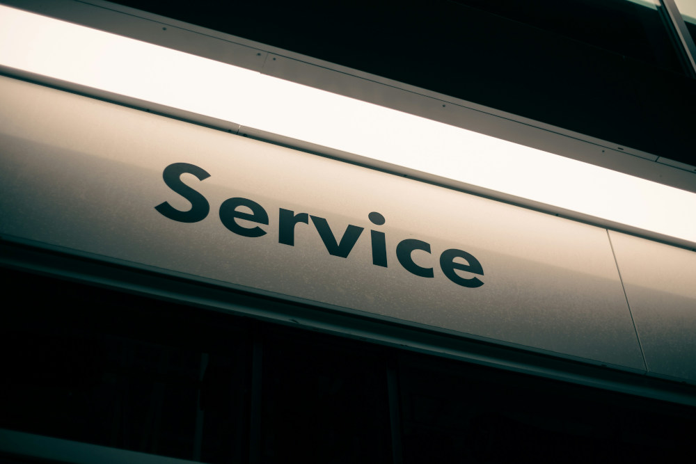 Neon sign with Service showing